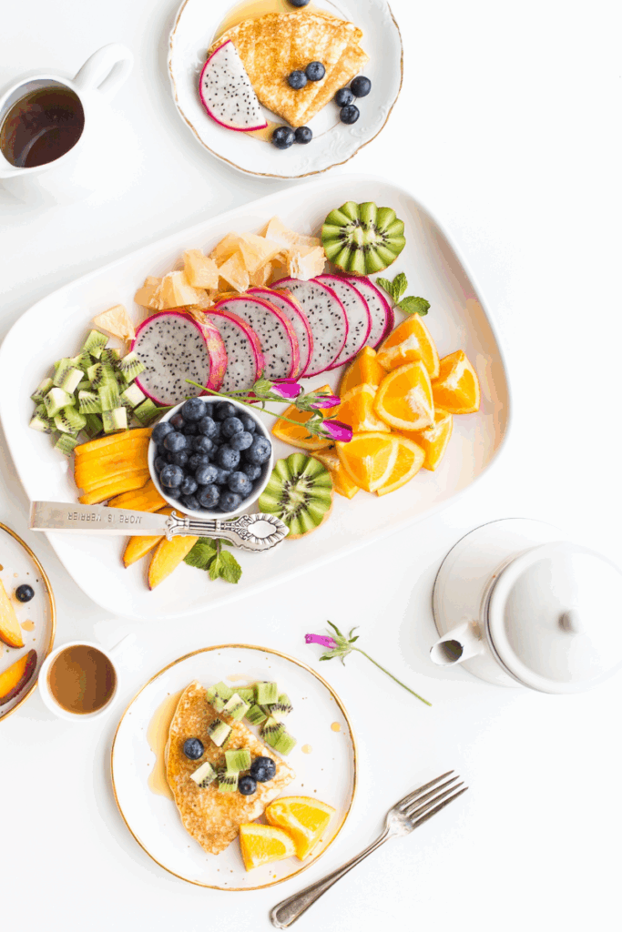 A woman with her hands on her face.